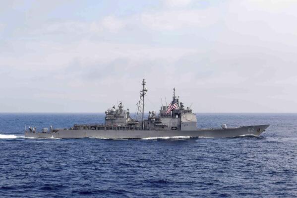 The guided-missile cruiser USS Chancellorsville (CG 62) transits the Philippine Sea, June 18, 2016. The U.S. Navy is sailing the USS Chancellorsville and the USS Antietam warships through the Taiwan Strait Sunday, Aug. 28, 2022, in the first such transit publicized since U.S. House Speaker Nancy Pelosi visited Taiwan earlier in August, at a time where tensions have kept the waterway particularly busy. (Mass Communication Specialist 2nd Class Ryan J. Batchelder/U.S. Navy via AP)