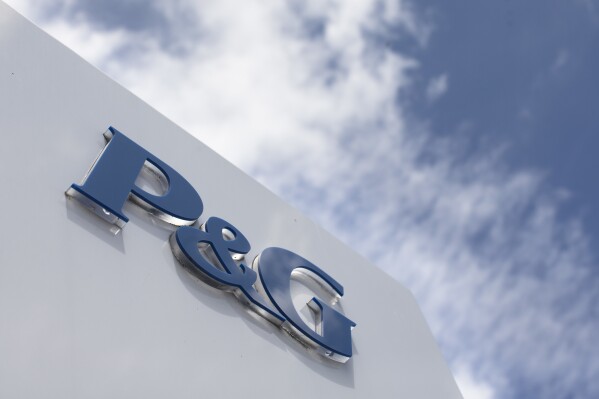 This July 9, 2015, file photo, shows signage outside Procter & Gamble corporate headquarters in downtown Cincinnati. (AP Photo/John Minchillo, File)