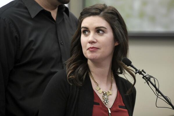FILE - Larissa Boyce makes her victim impact statement about Larry Nassar on Friday, Jan. 19, 2018 in Lansing, Mich. Physical and occupational therapists and athletic trainers will now be required to report suspected child abuse or neglect under a new Michigan law that follows the Larry Nassar sexual abuse scandal. (Dale G. Young/Detroit News via AP File)