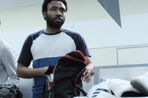 This image released by FX shows Donald Glover in a scene from the second season of "Atlanta." The third season will premiere at the  South by Southwest Film Festival. (Guy D'Alema/FX via AP)