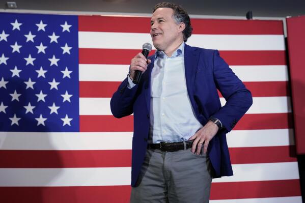 Republican candidate for Pennsylvania U.S. Senate Dave McCormick talks to supporters as returns show a close race during his returns watch party in the Pennsylvania primary election, Tuesday, May 17, 2022, in Pittsburgh. (AP Photo/Keith Srakocic)