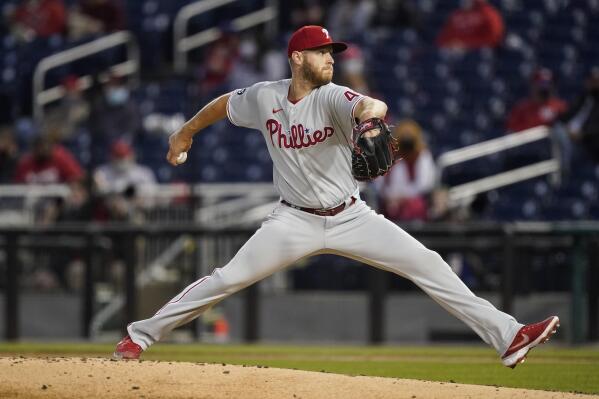 Philadelphia Phillies' Didi Gregorius, left, and Zack Wheeler put