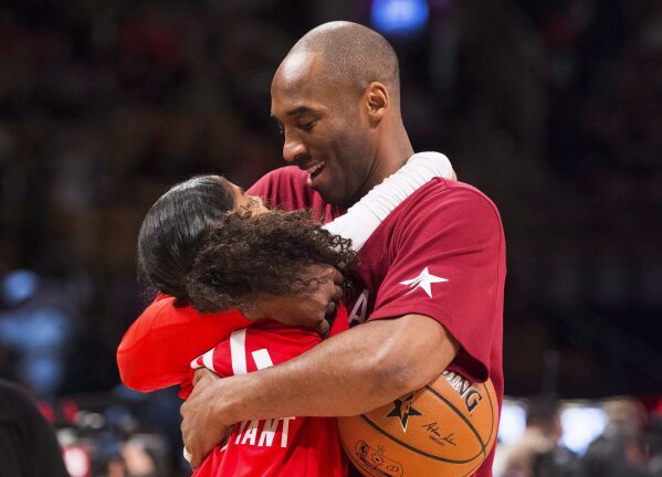 Kobe Bryant was proud of his daughter Gianna, a basketball star in making.  They died together in chopper - Los Angeles Times