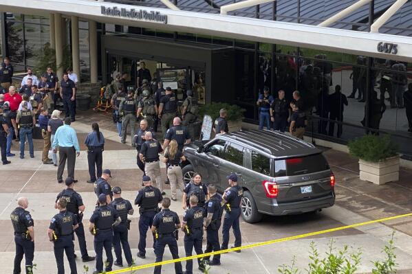 Emergency personnel respond to a shooting at the Natalie Medical Building Wednesday, June 1, 2022. in Tulsa, Okla. Multiple people were shot at a Tulsa medical building on a hospital campus Wednesday. (Ian Maule/Tulsa World via AP)