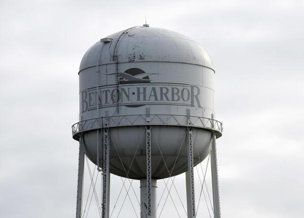 FILE - In this Wednesday, Oct 24, 2018 file photo, a water tower is pictured near downtown Benton Harbor, Mich. Advocacy groups are urging the Biden administration to help provide safe drinking water in Benton Harbor, a low-income, majority-Black city in southwestern Michigan where tests repeatedly have shown excessive lead levels. (Don Campbell/The Herald-Palladium via AP)