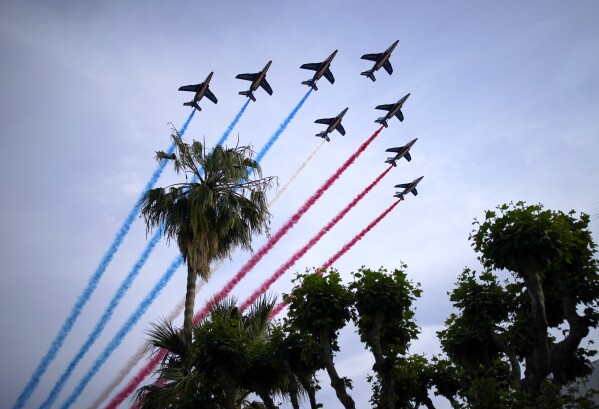 French Alpha Jets Patrouille de France fly over the premiere of the film 'Top Gun: Maverick' at the 75th international film festival, Cannes, southern France, Wednesday, May 18, 2022, File. (AP Photo/Daniel Cole)
