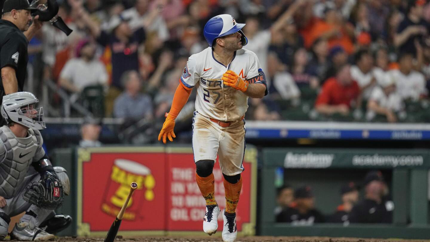 Altuve and Walker each hit a 2-run homer to help the Astros beat the Tigers 8-5