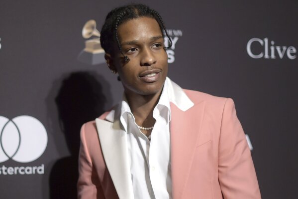 FILE - This Feb. 9, 2019 file photo shows A$AP Rocky at Pre-Grammy Gala And Salute To Industry Icons in Beverly Hills, Calif.  Prosecutors in Sweden are dropping the investigation of a man they say was involved in a fight with American rapper A$AP Rocky. The platinum-selling, Grammy-nominated artist whose real name is Rakim Mayers, has been behind bars since early this month as police investigate the fight in Stockholm.(Photo by Richard Shotwell/Invision/AP, File)