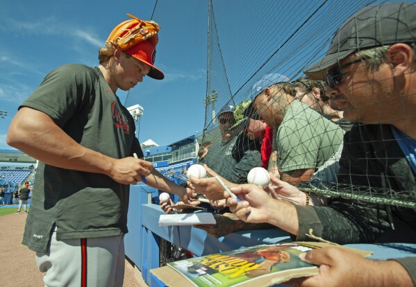 Orioles reassign prized prospect Jackson Holliday to minor league camp | AP  News