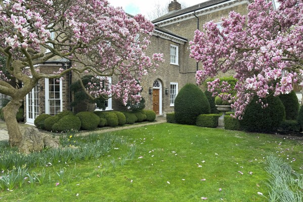 This undated handout image shows the house known as the Garden Lodge in London, where rock star Freddie Mercury's lived the final decade of his life. The mansion that was Freddie Mercury's sanctuary in London is on sale for the first time in nearly 45 years. (Barney Hindle via AP)