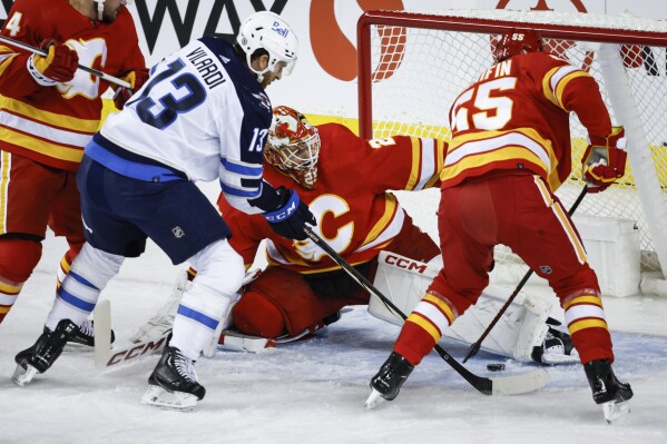 Andrew Mangiapane has 2 goals and an assist, Flames beat Jets 5-3