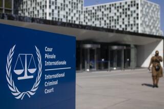 FILE - The exterior view of the International Criminal Court in The Hague, Netherlands, March 31, 2021. The International Criminal Court marked the 20th anniversary of its establishment Friday, July 1, 2022, as its prosecutors probed war crimes in countries around the world including what one expert called a “make or break” investigation in Ukraine. (AP Photo/Peter Dejong, File)