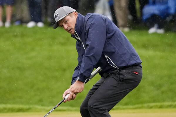 Bryson DeChambeau reacts after missing a putt on the second hole during the third round of the PGA Championship golf tournament at Oak Hill Country Club on Saturday, May 20, 2023, in Pittsford, N.Y. (AP Photo/Seth Wenig)
