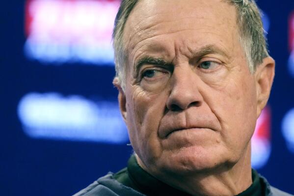 New England Patriots head coach Bill Belichick listens to a reporter's question during an availability prior to a football practice, Wednesday, Dec. 28, 2022, in Foxborough, Mass. (AP Photo/Charles Krupa)