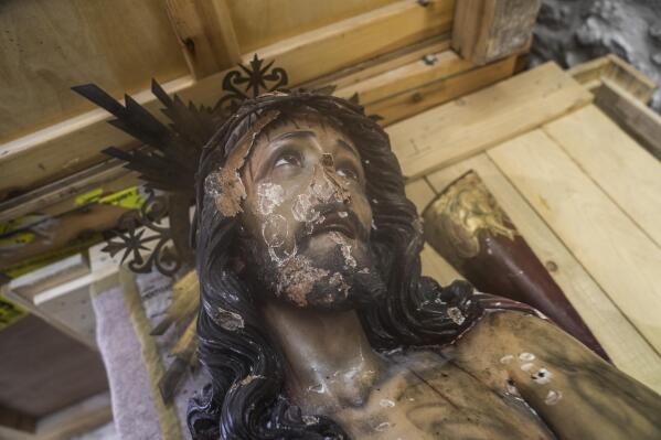 A damaged statue of Jesus in the Church of the Flagellation in Jerusalem's Old City, Thursday, Feb. 2, 2023. Israeli police on Thursday arrested an American tourist after he allegedly knocked down and broke a statue of Jesus in a church in Jerusalem's Old City. (AP Photo/Mahmoud Illean)