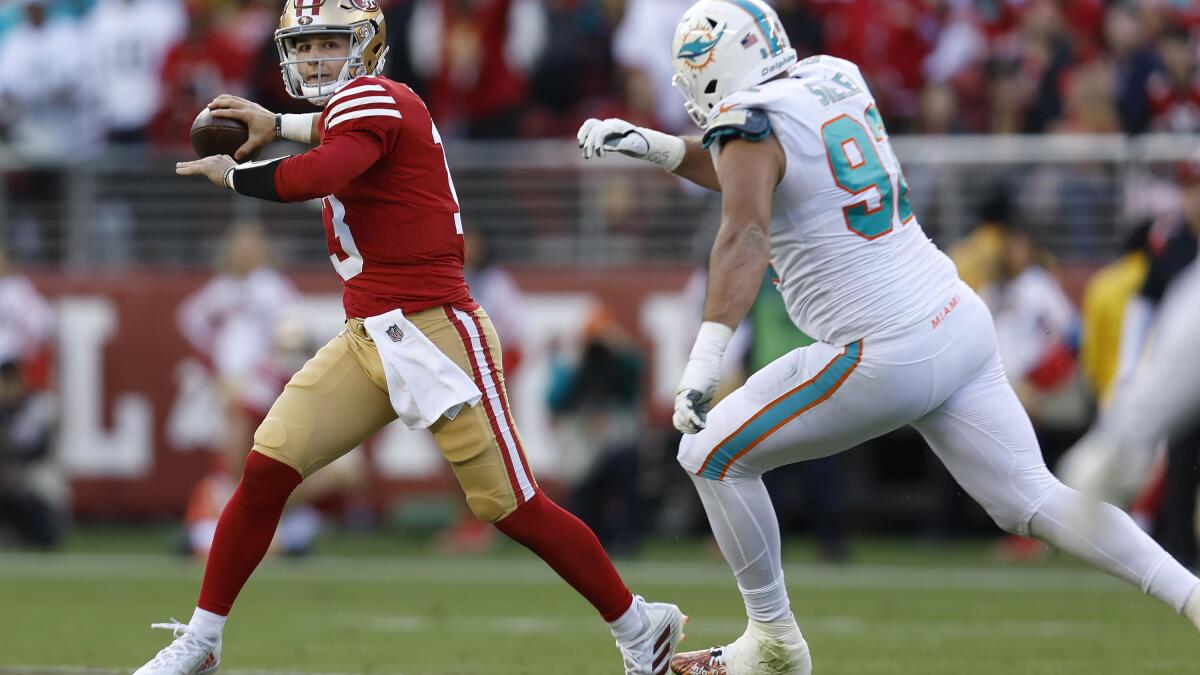 Purdy, defense lead 49ers past Fins; Garoppolo breaks foot