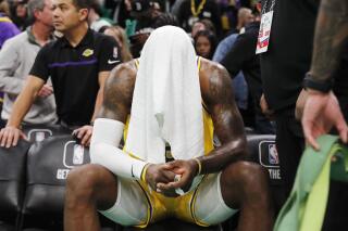 Lakers' LeBron James day-to-day with leg muscle strain