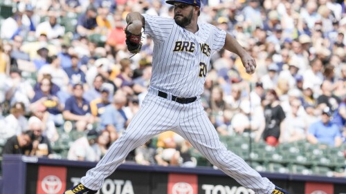 Milwaukee Brewers starter Wade Miley throws during the first inning of a baseball game against the Pittsburgh Pirates on Saturday, June 17, 2023, in Milwaukee.  (AP Photo/Morry Gash)