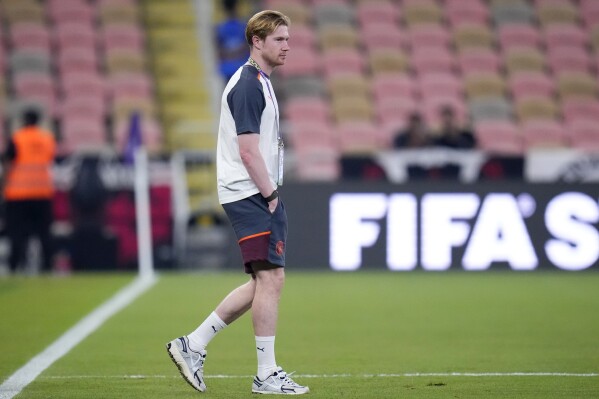 Manchester City's Kevin De Bruyne walks on to the pitch before the Soccer Club World Cup semifinal soccer match between Urawa Reds and Manchester City FC at King Abdullah Sports City Stadium in Jeddah, Saudi Arabia, Tuesday, Dec. 19, 2023. (AP Photo/Manu Fernandez)