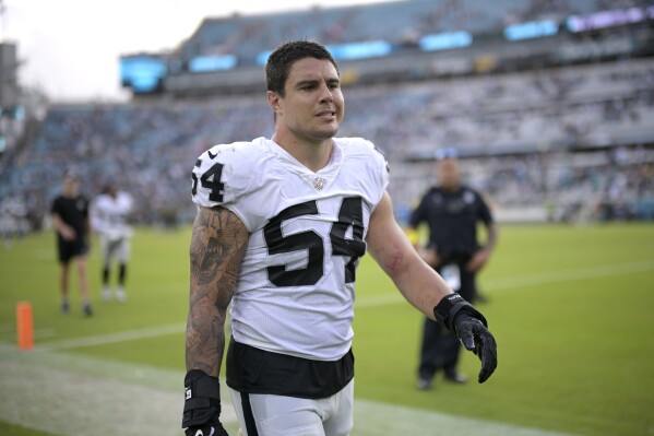 FILE - Las Vegas Raiders linebacker Blake Martinez (54) leaves the field after a loss to the Jacksonville Jaguars during an NFL football game, Sunday, Nov. 6, 2022, in Jacksonville, Fla. Martinez has joined the Carolina Panthers practice squad and the team is hoping he can help offer some stability to a position that has been ravaged by injuries, Tuesday, Nov. 7, 2023. (AP Photo/Phelan M. Ebenhack, File)