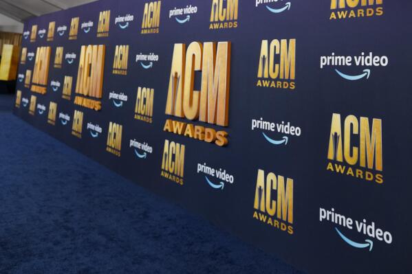 FILE - The red carpet is pictured at the 57th Academy of Country Music Awards on Monday, March 7, 2022, at Allegiant Stadium in Las Vegas. The Academy of Country Music Awards is heading to Texas next year as they continue their live-streaming partnership with Amazon Prime Video. The awards show will be held on May 11 at the Ford Center at the Star in Frisco, an indoor football stadium at the Dallas Cowboys team headquarters.  (AP Photo/Eric Jamison, File)