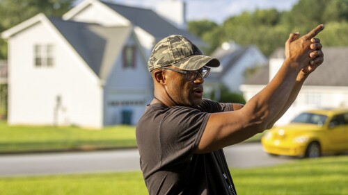 Dogwood Lakes housing development resident Frankie Worth describes how he witnessed the shooting of his neighbor during a mass shooting in Hampton, Ga., Saturday, July 15, 2023. (Steve Schaefer/Atlanta Journal-Constitution via AP)