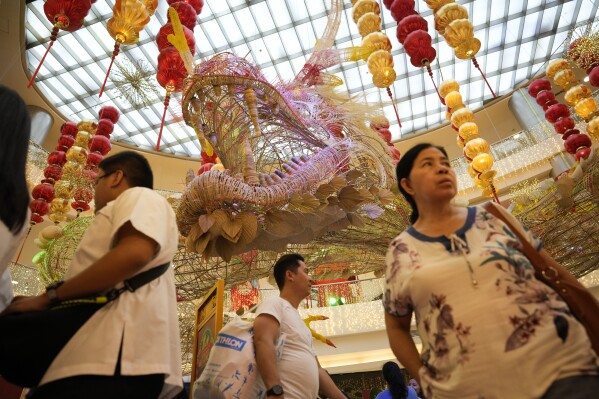 A giant wood dragon is displayed at a mall at Binondo district, said to be the oldest Chinatown in the world, in Manila, Philippines. (APPhoto/Aaron Favila)