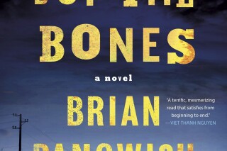 This image released by St. Martin’s Publishing Group shows “Nothing But the Bones” by Brian Panowich. (St. Martin’s Publishing Group via AP)