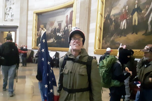 This image contained in the Justice Department's sentencing memorandum, shows Kevin Loftus, at the U.S. Capitol on Jan. 6, 2021, in Washington. (Department of Justice via AP)