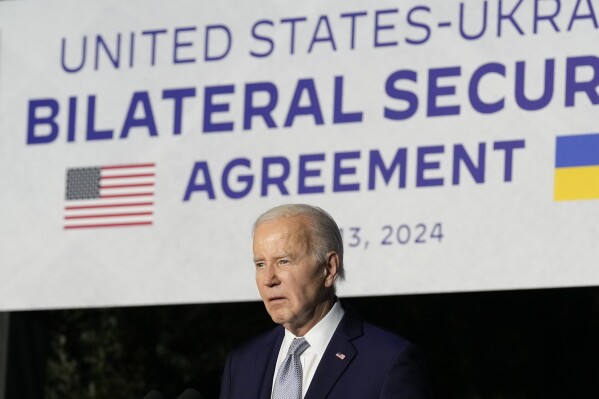 U.S. President Joe Biden listens to a question during a news conference after signing a bilateral security agreement with Ukraine's President Volodymyr Zelenskyy during the sidelines of the G7 summit at Savelletri, Italy, Thursday, June 13, 2024. (AP Photo/Andrew Medichini)