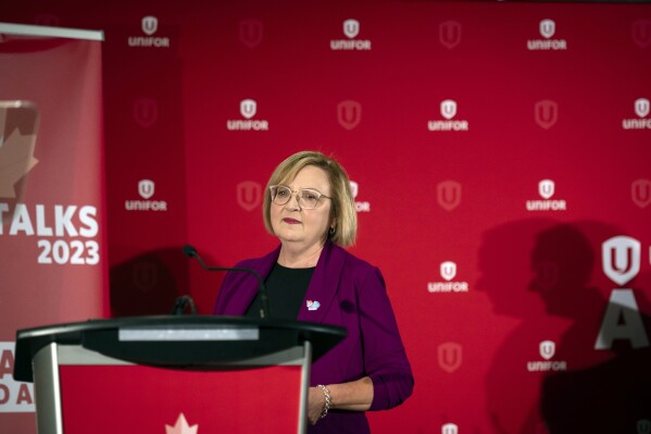 FILE - Lana Payne, Unifor national president speaks during a news conference, Aug. 29, 2023, in Toronto. Unifor, which represents about 4,300 workers at three General Motors facilities in Canada, said Monday, Sept. 25, 2023, that it reached a strong deal with Ford and now will try to negotiate a pattern agreement with GM. (Tijana Martin/The Canadian Press via AP, File)