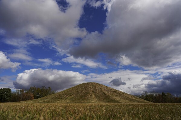 The Central Mound, the largest mound of the Mound City Group, is seen at Hopewell Culture National Historical Park in Chillicothe, Ohio, Saturday, Oct. 14, 2023, before the Hopewell Ceremonial Earthworks UNESCO World Heritage Inscription Commemoration ceremony. A network of ancient American Indian ceremonial and burial mounds in Ohio noted for their good condition, distinct style and cultural significance, including Hopewell Culture National Historical Park, was added to the list of UNESCO World Heritage sites. (AP Photo/Carolyn Kaster)