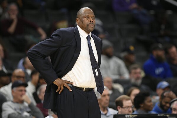 FILE - In this Wednesday, Feb. 5, 2020, file photo, Georgetown head coach Patrick Ewing looks on during the first half of an NCAA college basketball game against Seton Hall, in Washington. In a statement issued by Georgetown on Friday, May 22, 2020, Ewing has tested positive for COVID-19. (AP Photo/Nick Wass, File)