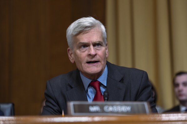 Sen. Bill Cassidy, R-La., votes aye at the final moment as the Senate Finance Committee holds a roll call vote to approve the nomination of Robert F. Kennedy Jr. to lead the Health and Human Services Department, at the Capitol in Washington, Feb. 4, 2025. (AP Photo/J. Scott Applewhite, File)