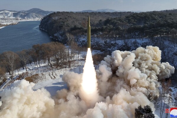 This photo provided by the North Korean government, shows what it says a flight test of a new solid-fuel intermediate-range in North Korea Sunday, Jan. 14, 2024. Independent journalists were not given access to cover the event depicted in this image distributed by the North Korean government. The content of this image is as provided and cannot be independently verified. Korean language watermark on image as provided by source reads: 