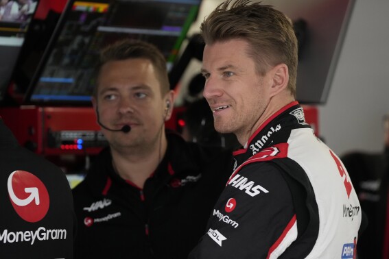Haas driver Nico Hulkenberg of Germany reacts in the garage during the second free practice session at the Suzuka Circuit in Suzuka, central Japan, Friday, April 5, 2024, ahead of Sunday's Japanese Formula One Grand Prix. (AP Photo/Hiro Komae)