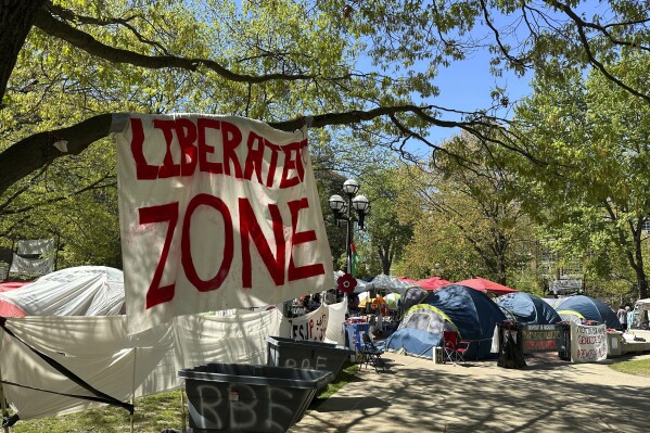 Dozens of tents were in place as part of a pro-Palestinian protest at the University of Michigan in Ann Arbor, Mich., on Thursday, May 2, 2024. The school said staff and volunteers have been trained to manage any disruptions that might occur at graduation at Michigan Stadium on May 4. (AP Photo/Ed White)