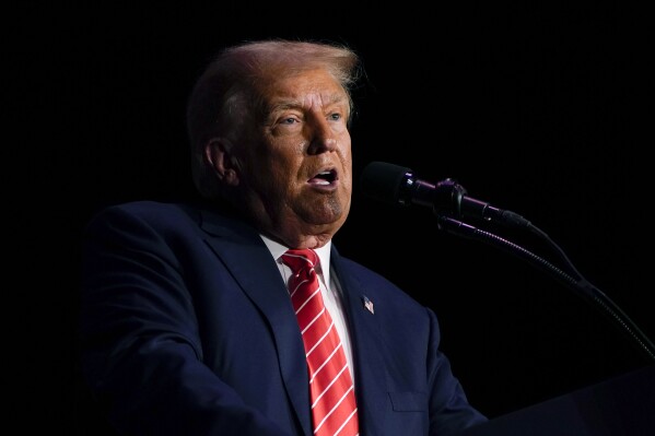 Former President Donald Trump speaks during a commit to caucus rally, Sunday, Oct. 29, 2023, in Sioux City, Iowa. (AP Photo/Charlie Neibergall)