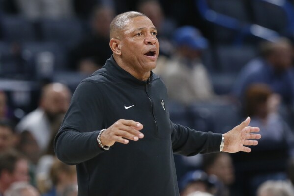 Milwaukee Bucks coach Doc Rivers instructs his team during the second half of his team's NBA basketball game against the Oklahoma City Thunder, Friday, April 12, 2024, in Oklahoma City. (AP Photo/Nate Billings)