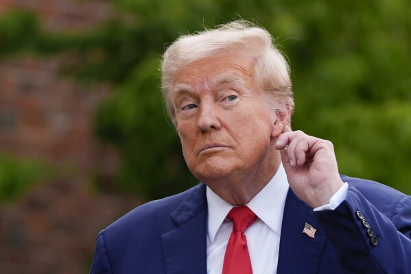 Republican presidential nominee former President Donald Trump listens to a question after a news conference at Trump National Golf Club, Thursday, Aug. 15, 2024, in Bedminster, N.J. (AP Photo/Julia Nikhinson)