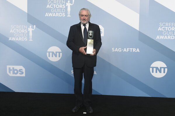 Robert De Niro poses in the press room with the lifetime achievement award at the 26th annual Screen Actors Guild Awards at the Shrine Auditorium & Expo Hall on Sunday, Jan. 19, 2020, in Los Angeles. (Photo by Jordan Strauss/Invision/AP)