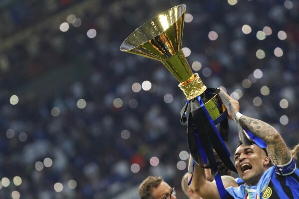 Inter's Lautaro Martinez celebrates winning the Scudetto after Serie A soccer match between Inter and Lazio at the San Siro Stadium in Milan, Italy, Sunday, May 19, 2024. (Spada/LaPresse via AP)