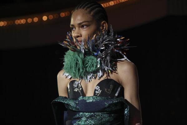 A model wears a creation as part of the Vivienne Westwood Ready To Wear Fall/Winter 2022-2023 fashion collection, unveiled during the Fashion Week in Paris, Saturday, March 5, 2022. (Photo by Vianney Le Caer/Invision/AP)