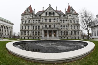 FILE - The New York Capitol is seen, Dec. 14, 2020, in Albany, N.Y. New York lawmakers passed another extension for the state's budget on Thursday, April 4, 2024, to ensure operations continue undisrupted and state workers get paid while negotiations are still underway. (AP Photo/Hans Pennink, File)
