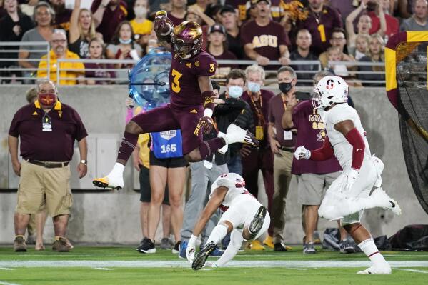 Arizona State running back Rachaad White (3) leaps over Stanford safety Alaka'i Gilman as Stanford linebacker Levani Damuni gives chase during the first half of an NCAA college football game Friday, Oct. 8, 2021, in Tempe, Ariz. (AP Photo/Ross D. Franklin)