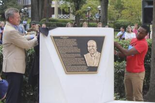 Harding University Executive Vice President Dr. David Collins, left, and Brandt Jean, the brother of Harding graduate Botham Jean, unveil the Botham Jean Memorial on Wednesday, Sept. 29, 2021 in  Searcy, Ark. Botham Jean, who graduated in 2016, was killed in 2018 in his Dallas apartment by an off-duty police officer. Brandt Jean is a student at the university.  (Greg Geary/The Daily Citizen via AP)



/// [EXTERNAL] Greg Geary Reporter The Daily Citizen501-268-8621 ext. 108 thedailycitizen.com/The Daily Citizen via AP)/The Daily Citizen via AP)