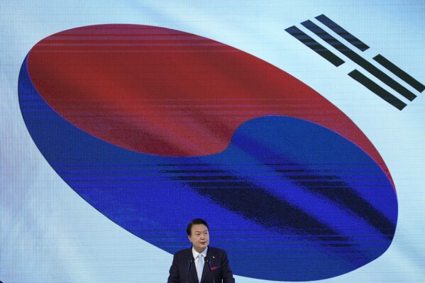 South Korean President Yoon Suk Yeol delivers a speech during a ceremony to celebrate the 78th anniversary of the Korean Liberation Day from Japanese colonial rule in 1945, in Seoul, South Korea, Tuesday, Aug. 15, 2023. (AP Photo/Lee Jin-man, Pool)