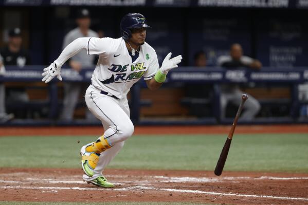 Tampa Bay Rays' Wander Franco leaves the batter's box with a triple against the New York Yankees during the eighth inning of a baseball game Saturday, May 28, 2022, in St. Petersburg, Fla. (AP Photo/Scott Audette)
