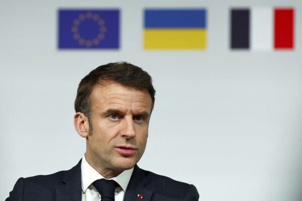 French President Emmanuel Macron speaks during a press conference at the Elysee Palace in Paris, Monday, Feb. 26, 2024. More than 20 European heads of state and government and other Western officials are gathering in a show of unity for Ukraine, signaling to Russia that their support for Kyiv isn't wavering as the full-scale invasion grinds into a third year. (Gonzalo Fuentes/Pool via AP)