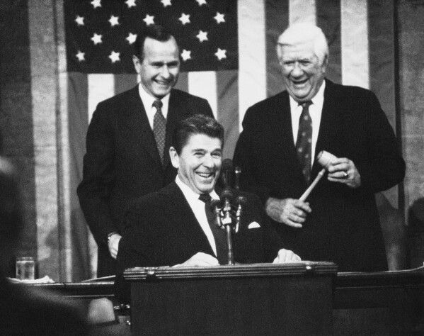 FILE - This Jan. 25, 1983 file photo shows President Ronald Reagan receiving applause prior to making his State of the Union Address on Capitol Hill in Washington. (A Photo/Bob Daugherty, File)